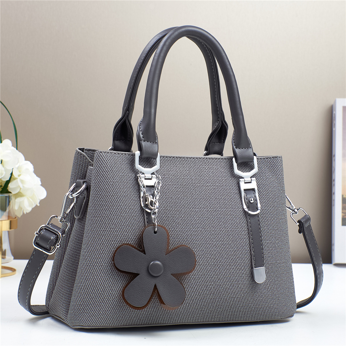 Womens Fashionable Textured Handbag with Flower Charm
